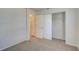 Bright bedroom with spacious closet and neutral carpeting at 2369 N Biscayne Dr, North Port, FL 34291