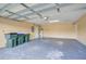 Attached garage with extra storage and utility space at 2369 N Biscayne Dr, North Port, FL 34291