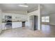 Eat-in kitchen with stainless steel appliances and granite countertops at 2369 N Biscayne Dr, North Port, FL 34291