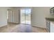 Kitchen with sliding glass door leading to backyard at 2369 N Biscayne Dr, North Port, FL 34291