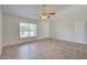 Living room with tile floors and ceiling fan at 2369 N Biscayne Dr, North Port, FL 34291