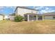 Two story home with screened porch and large backyard at 2436 Sand Gables Trl, Bradenton, FL 34208