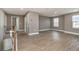 Spacious bonus room with wood-look floors and neutral walls at 2436 Sand Gables Trl, Bradenton, FL 34208