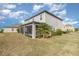 Two-story home with screened patio and grassy backyard at 2436 Sand Gables Trl, Bradenton, FL 34208