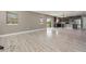 Open kitchen with dark cabinets, island, and stainless steel appliances at 2436 Sand Gables Trl, Bradenton, FL 34208