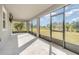 Spacious screened porch overlooking backyard at 2436 Sand Gables Trl, Bradenton, FL 34208