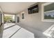 Screened porch with TV mount and access to backyard at 2436 Sand Gables Trl, Bradenton, FL 34208