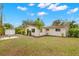 Charming home with a spacious backyard, shed, and patio at 2699 56Th N Ln, St Petersburg, FL 33710