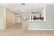 Open dining area with tile flooring and chandelier at 2699 56Th N Ln, St Petersburg, FL 33710