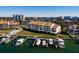 Waterfront condo building with private boat slips and community pool at 2795 Kipps Colony S Dr # 104, St Petersburg, FL 33707