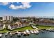 Aerial view of waterfront condo community with private docks and pool at 2795 Kipps Colony S Dr # 104, St Petersburg, FL 33707