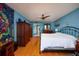 Bedroom with a king-size bed, hardwood floors, and a ceiling fan at 2795 Kipps Colony S Dr # 104, St Petersburg, FL 33707