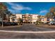 Front view of building with parking and landscaping at 2795 Kipps Colony S Dr # 104, St Petersburg, FL 33707