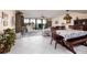 Condo dining area with table, chairs, and view of living room at 2795 Kipps Colony S Dr # 104, St Petersburg, FL 33707