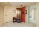 Bright condo entryway with tiled floor and coral door at 2795 Kipps Colony S Dr # 104, St Petersburg, FL 33707