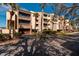 Building exterior showcasing architectural details and landscaping at 2795 Kipps Colony S Dr # 104, St Petersburg, FL 33707