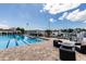Pool area with lounge chairs and marina view at 2795 Kipps Colony S Dr # 104, St Petersburg, FL 33707