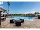 Resort-style pool with lounge chairs and fire pit at 2795 Kipps Colony S Dr # 104, St Petersburg, FL 33707