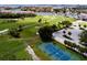 An aerial view of a tennis court within a community at 2795 Kipps Colony S Dr # 104, St Petersburg, FL 33707