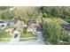 Bird's eye view of a home with a pool and lush green surroundings at 2801 Norwood Hills Ln, Valrico, FL 33596