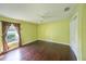 Bedroom with dark wood floors and ceiling fan at 2801 Norwood Hills Ln, Valrico, FL 33596