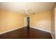 Bright bedroom featuring wood floors and a ceiling fan at 2801 Norwood Hills Ln, Valrico, FL 33596