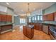 Spacious kitchen with island, stainless steel appliances, and ample cabinetry at 2801 Norwood Hills Ln, Valrico, FL 33596