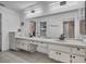 Double vanity bathroom with modern fixtures and ample storage at 3028 Summervale Dr, Holiday, FL 34691