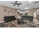 Spacious living room with ceiling fan and comfortable seating at 3028 Summervale Dr, Holiday, FL 34691