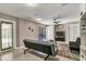 Living room with pool view, ceiling fan and comfortable seating at 3028 Summervale Dr, Holiday, FL 34691