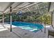 Enclosed screened pool area, perfect for relaxation at 3028 Summervale Dr, Holiday, FL 34691