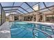 Large screened pool great for entertaining at 3028 Summervale Dr, Holiday, FL 34691