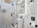 Stylish bathroom with walk-in shower and pebble floor at 3031 W Asbury Pl, Tampa, FL 33611