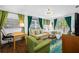 Spacious bedroom with a sitting area, and access to a balcony at 3031 W Asbury Pl, Tampa, FL 33611