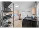 Laundry room with washer, dryer, cabinets and shelving at 3031 W Asbury Pl, Tampa, FL 33611