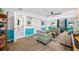 Living room features a bathroom and seating area at 3031 W Asbury Pl, Tampa, FL 33611