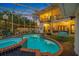 Night view showcasing the home's exterior and pool area at 3031 W Asbury Pl, Tampa, FL 33611