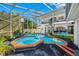 Expansive pool and patio area with outdoor seating at 3031 W Asbury Pl, Tampa, FL 33611