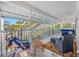 Spacious screened balcony overlooking the pool and backyard at 3031 W Asbury Pl, Tampa, FL 33611