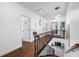 Elegant staircase with wrought iron railing leading to upper level at 3031 W Asbury Pl, Tampa, FL 33611