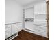 Large walk-in closet with ample shelving and drawer space at 3031 W Asbury Pl, Tampa, FL 33611
