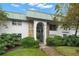 Tiffany Gardens condo building, featuring a well-maintained exterior and landscaping at 3100 Hartford N St # 224, St Petersburg, FL 33713