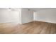 Open living area with wood-look floors at 3100 Hartford N St # 224, St Petersburg, FL 33713