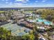 Aerial view of community amenities including pool and courts at 402 Dorchester Pl # 28, Sun City Center, FL 33573