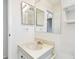 Bathroom with sink and mirrored medicine cabinet at 402 Dorchester Pl # 28, Sun City Center, FL 33573