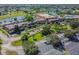 An aerial view of the community center and parking area at 402 Dorchester Pl # 28, Sun City Center, FL 33573