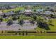 Aerial view of community center with large parking lot at 402 Dorchester Pl # 28, Sun City Center, FL 33573
