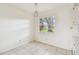Bright dining area with tile floors and view to backyard at 402 Dorchester Pl # 28, Sun City Center, FL 33573