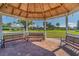 Relaxing community gazebo with benches at 402 Dorchester Pl # 28, Sun City Center, FL 33573