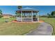 Community gazebo with benches and landscaping at 402 Dorchester Pl # 28, Sun City Center, FL 33573